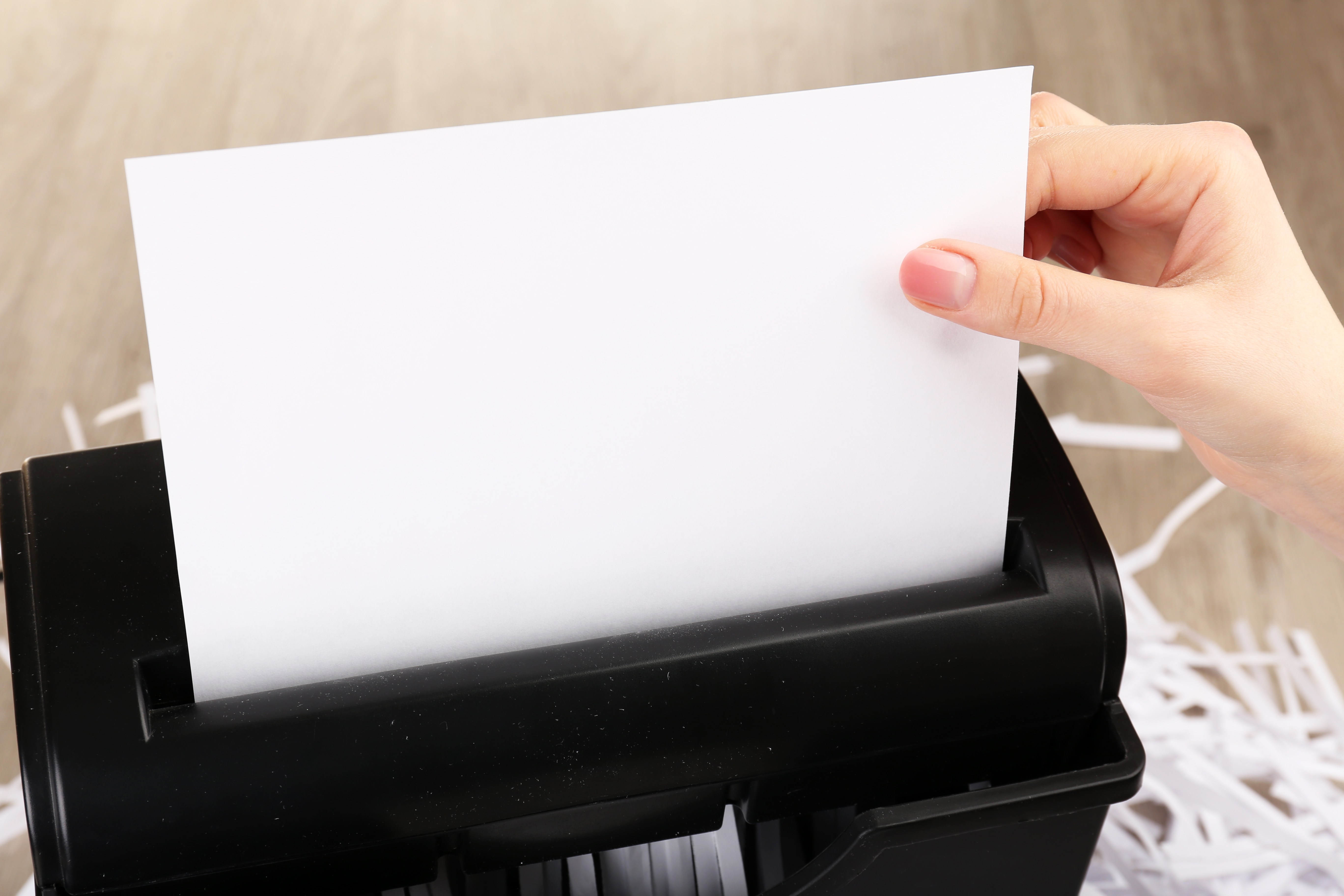 Shred sensitive documents when you're purging papers. You don't want your personal info to fall into the wrong hands! || How to declutter papers | overwhelmed by paper clutter | shredding paper